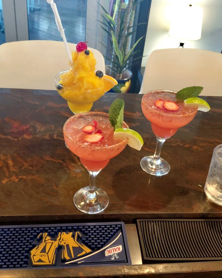 Strawberry margaritas and a frozen daiquiri at the bar