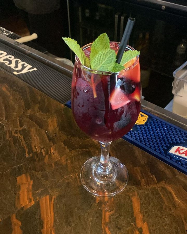 Red sangria with fresh mint at the bar